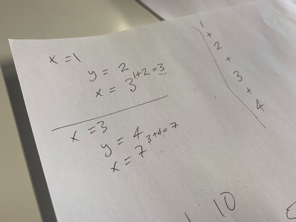 Image showing some workings. It reads
Loop 1: x = 1
y = 2
(1 + 2 = 3)
x = 3
Loop 2: x = 3
y = 4
(3 + 4 = 7)
x = 7